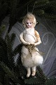 Old Christmas 
tree ornament 
from around 
1900 in the 
shape of a 
Christmas girl 
made of cotton 
...