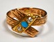Antique 14 
carat red gold 
ring with two 
brilliant-cut 
diamonds and 
one turquoise. 
Hallmarked. ...