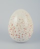 Höganäs, 
Sweden.
Stoneware egg.
Brown glaze on 
a white base.
Handmade.
Circa ...