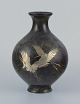 Japan, large 
round vase in 
brass.
Motif of 
cranes in 
silver.
Circa 1930s.
In excellent 
...