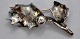Brooch in 
sterling silver 
by Ove Eriksen, 
1955, Åbyhøj, 
Denmark. Shaped 
like a holly 
leaf with ...
