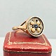 A ring in 9k 
gold set with a 
sapphire, 
pearls and 
diamonds 
mounted in 
white gold. 
Around 1920 - 
...