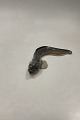 Bing and 
Grondahl 
Figurine of eel 
No 1634. 
Measures 19 cm 
/ 7 31/64 in. 

