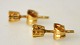 A pair of 18 
carat red gold 
ear sticks, 
20th century 
with 
brilliant-cut 
diamonds. 
Hallmarked