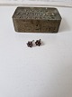 Pair of vintage 
star-shaped 
earrings in 
gold-plated 
silver adorned 
with numerous 
dark red ...