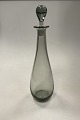 Holmegaard Tear 
Drop shaped 
Carafe in smoke 
glass
Measures 
38,5cm / 15.16 
inch