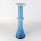 Vase i opal 
hvid mundblæst 
glas med blåt 
overfang. Vasen 
kan også bruges 
som ...