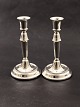 A pair of 830 
silver 
candlesticks