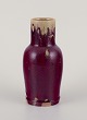 Swedish 
ceramicist.
Unique ceramic 
vase.
Float glaze in 
violet tones.
Glossy ...