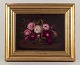 Danish painter.
Oil on canvas.
Roses in 
basket.
Late 19th 
century.
Signed.
In excellent 
...