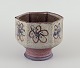 Birgit Krog, 
Danish 
ceramist.
Unique 
hexagonal 
ceramic vase. 
Raku 
technique.
Glazed and ...