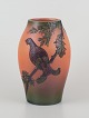 Ipsens, 
Bornholm.
Ceramic vase.
Motif of bird 
on branch.
Orange, green 
and brown ...