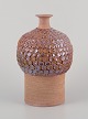Rolf Fagerberg, 
Swedish 
ceramist.
Unique clay 
vase.
Unglazed and 
glazed.
Small round 
flower ...