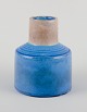 Nils Kähler for 
Kähler.
Stoneware 
vase.
Stylish and 
modernist 
design.
Azure blue 
glaze and ...
