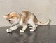 Bing & 
Grondahl: Early 
porcelain 
figurine of a 
cat playing 
with a ball. 
Made in the 
early 20th ...