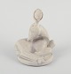 Arne Bang 
(1901-1983), 
ceramic 
sculpture of a 
fawn.
Glaze in light 
sandy tones.
Model number: 
...