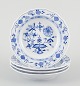 Meissen, 
Germany. A set 
of four small 
Blue Onion 
pattern 
porcelain 
plates.
Hand-painted 
...