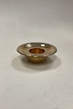 Royal 
Copenhagen 
Orion 
Candlestick. 
Gold-plated 
aluminum. 
Suitable for 
block candles 
or tea ...