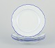 Meissen, 
Germany. A set 
of four dinner 
plates.
White 
porcelain with 
blue rim.
Early 20th ...