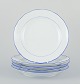 Meissen, 
Germany. A set 
of five dinner 
plates.
White 
porcelain with 
blue rim.
Early 20th ...