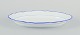 Meissen, 
Germany. Oval 
serving dish.
White 
porcelain with 
blue rim.
Early 20th ...