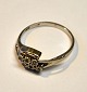 14k white gold 
ring, 20th 
century, with 6 
diamonds. 6/32. 
Stamped. Size 
51/52. Weight: 
2 grams.