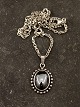 N E From 
sterling silver 
pendant with 
bloodstone 1.8 
x 2.5 cm. and 
sterling silver 
chain 48 cm. 
...