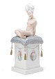 Gerhard Henning 
for Royal 
Copenhagen. 
Porcelain 
bobblehead doll 
‘Ane Mari’ 
decorated with 
...