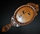 Sorrento hand 
mirror, 19th 
century. Italy. 
Polished olive 
wood with 
inlays in the 
shape of ...
