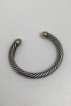David Yurman 
Sterling Silver 
/ 14K Gold 
Bracelet 
Measures inside 
5.9 cm x 4.7 cm 
(2.32 inch x 
...