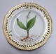 Royal 
Copenhagen 
Flora Danica. 
Lunch plate 
with open-work 
border. Design 
# 3554. 
Diameter 23 cm. 
...