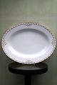 Rare Royal 
Copenhagen oval 
dish in 
Princess with 
gold 
decorations. 
Decoration 
number: 
732/531. ...