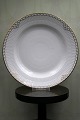 Rare Royal 
Copenhagen 
dinner plate in 
Princess with 
gold 
decorations. 
Decoration 
number: ...