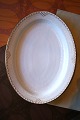 Rare oval Royal 
Copenhagen 
serving dish in 
Princess with 
gold 
decorations. 
41x32.5cm. 
Decoration ...