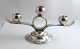 C. F. Heise. 
Sterling (925). 
3-arm 
candlestick. 
Height 12.5 cm. 
Length 25 cm. 
Produced 1938.