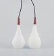 A pair of Louis 
Poulsen 
pendants in 
opal glass and 
precious wood.
Fyens Glasværk 
/ ...