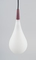 Louis Poulsen 
pendant in opal 
glass and 
precious wood.
Fyens Glasværk 
/ ...