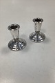 Pair of 
Candlesticks in 
Silver Plated. 
Has signs of a 
stamp, but the 
origin is 
uncertain. ...