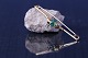This very 
special and 
unique gold 
brooch will 
complete any 
outfit with 
style and 
elegance. The 
...