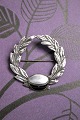 Fine, old 
Student brooch 
in silver and 
enamel.
Dia.: 4.8 cm.