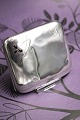 Old cigarette 
case in silver 
(stamped) with 
3 red stones 
and a fine 
monogram. 
Measures 
10x8.5cm. ...