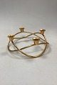 Georg Jensen 
Golden 
Christmas 
Candleholder - 
Advent Crown 
2004. 
Gold-plated 
stainless 
steel. ...