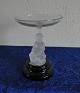 Business card 
bowl on black 
foot with 
figure of 
frozen glass in 
good condition.
Figure: 
Sitting ...
