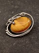 Sterling silver 
brooch 4 x 3.2 
cm. with amber 
2 x 2.8 cm. 
item no. 615019