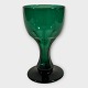Older green 
glass with 
faceted stem 
and ball-cut 
bottom, height 
11.5cm, nice 
condition
