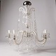 Large prism 
chandelier with 
five glass arms 
with electric 
light source 
from around the 
1930s. ...