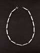 N E From 
sterling silver 
necklace