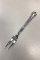 Danish 
Ornamental Meat 
Fork in Silver 
Measures 24 cm 
/ 9.45 inch
