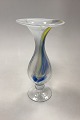 Holmegaard 
Cascade Glass 
Vase / Candle 
Holder. 
Designed by Per 
Lütken. The 
bowl is opal 
white at ...