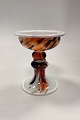 Holmegaard 
Cascade Glass 
Bowl / 
Candlestick. 
Designed by Per 
Lütken. The 
bowl is opal 
white, ...